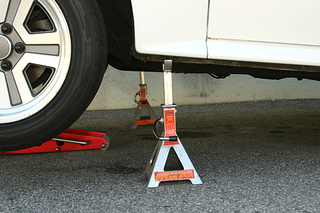 Illustration for article titled And You Will Know Us by the Trail of Parts: Using a Floor Jack and Jack Stands